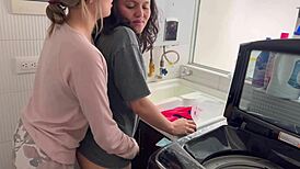 I watch two teens tribbing passionately in the kitchen