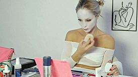 Pretty blonde does Harley Quinn makeup tutorial for Halloween