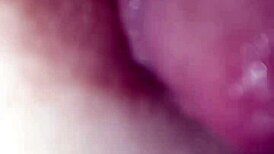 The nipple glistens with saliva on the glans