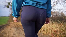 milf’s tight ass in leggings teased from behind during sporty walk