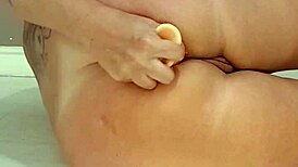 blonde amateur squirts huge on floor during barefoot assfucking