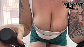 horny milf with big natural tits masturbates alone in the gym using toys for gaping