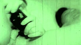 Vintage lesbians confess erotic secrets in a steamy retro threesome scene.