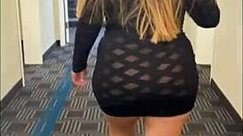 having fun in see through dress at hotel