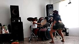 Neighbors Play Drums As She Strips And Shakes Her Huge Ass