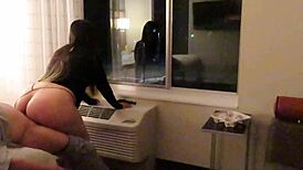 having fun in see through dress at hotel