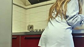Hot girl cleans the stove, shows her big ass and tits, then masturbates passionately
