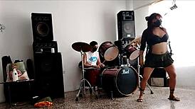 Neighbors Play Drums As She Strips And Shakes Her Huge Ass