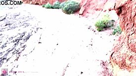 She performs deep blowjob in beautiful canyon with glasses