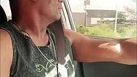 Black guy casually rubs his huge cock outdoors in public