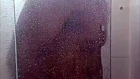 Black guy casually rubs his huge cock outdoors in public