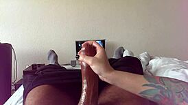 This couple does a homemade POV handjob with monster cock