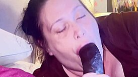 hot thick midget slurps and sucks on big black cock, choking and licking.