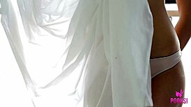 Blonde hottie Janna O strips and teases her perky tits.