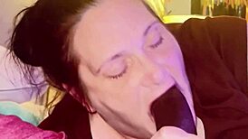 hot thick midget slurps and sucks on big black cock, choking and licking.