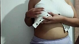 Milf massages her big natural tits with pleasure in a real homemade video