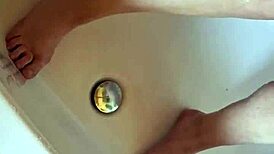 washing dirty feet in the bathtub