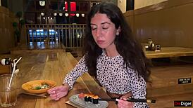Girl Eats Sushi Rolls In Public Bar