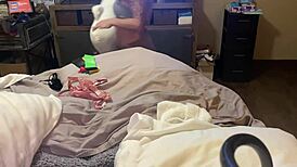 Young girl in lingerie lets guy play with her shaved pussy using dildo vibrator