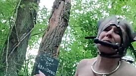 In the forest, the ponygirl slave experiences orgasm during doggystyle bdsm with bound tits and buttplug.