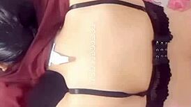 watch the 18-year-old secretary touch herself in bed.