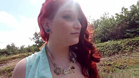 Is this nature boy fucking the big titty red head artist in the jungle?