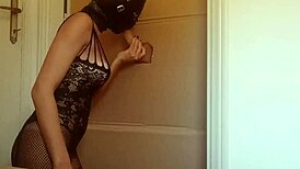 I suck and fuck through a gloryhole in nylon catsuit