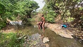 curvy ebony babe ready to be taken hard by the stream