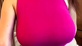 Feeling the intense pleasure as stepmother indulges in her big milky tits on webcam.