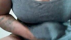 the kinky fuckers tattooed brunette fucks a dildo with her big tits bouncing