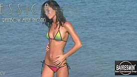 jessica dances sensually in bikini on beach, teasing with erotic moves