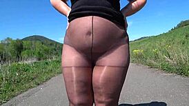 mature bbw in nylon pantyhose and high heels walks public road for foot fetish