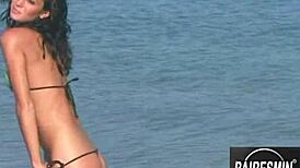 jessica dances sensually in bikini on beach, teasing with erotic moves