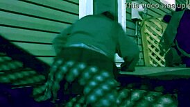 Watch the time lapse of a skinny woman stretching against steps at night, highlighting her legs and ass in leggings!