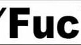 Surreal kitchen dress up scene with Abigail and her giant cucumber.