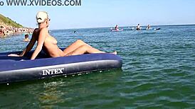 Nude Beach Blonde with Big Boobs and Tattoo