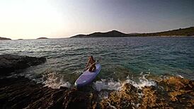 stranger on beach gets oil rub and facial cumshot