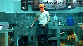 Overwhelmed by desire this 25-year-old man transforms his flaccid penis into a throbbing erection masturbating alone in the kitchen awaiting his best friend