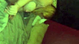 That big redhead milf with massive boobs gives an intense blowjob in this casual scene.