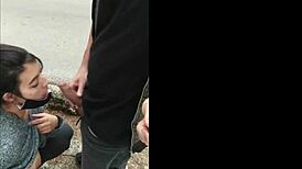watch this amateur brunette suck dick outdoor in public