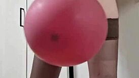 Sexy balloons mistress Elza Kom's financial domination unfolds with heels and lipstick.