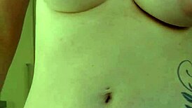 Blonde rubs suncream on tits while sunbathing publicly, flashing neighbors 😏