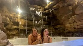 Couple enjoying honeymoon in motel, wife relaxing by the pool with a fun ride.