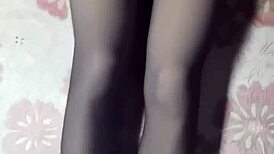 Asian Ladyboy Masturbates in Pantyhose