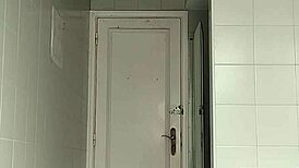 sexy guy shaving in black beach shorts