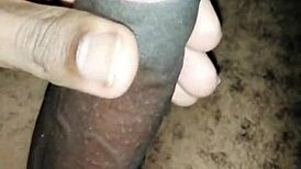 Masturbating with my big black cock balls!