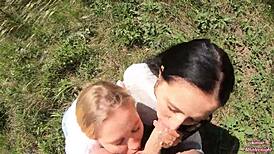 Smoking sluts suck cock and swallow cum in outdoor threesome