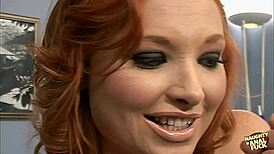 after double penetration, this redhead gets a bukkake over her face, wow!