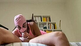 A brunette milf performs a perfect blowjob in fishnet stockings and heels