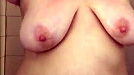 big boob mama showering washing hair & shaving